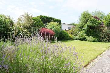 The pretty rear garden is a real suntrap and a lovely spot for morning coffee or sundowners