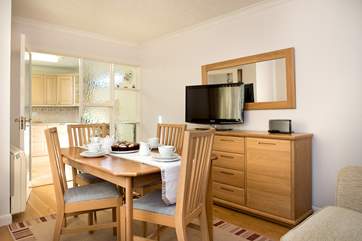 The dining room is easily accessed from the kitchen