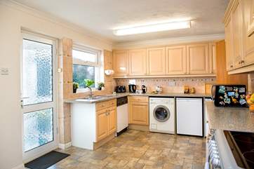 The rear garden is accessed from the kitchen- making it easy to serve up meals alfresco