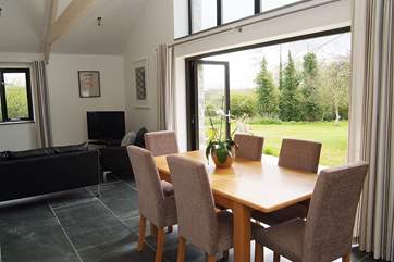 The large bi-fold doors open out to the patio and garden.