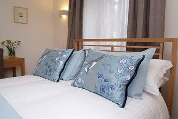 White crisp bed linen is used throughout the property.