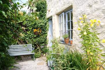 The pretty rear courtyard, the perfect place to relax.