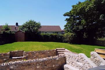 The view across the back garden from Bedroom 1.