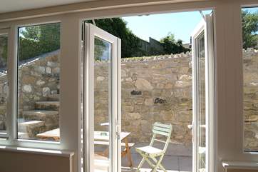 Double doors open out to the patio.