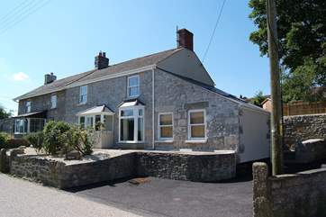 There is plenty of parking space beside the cottage; reversing into it will make it easier coming out.