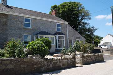 The front of this beautifully refurbished, surprisingly spacious old cottage.