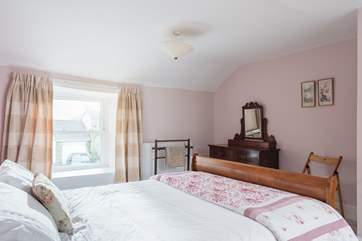 With two windows, the double bedroom is lovely and light.