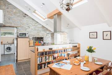 Looking through to the utility room which leads you also to the back door, the sun-room and ground floor shower-room.