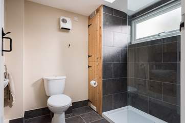 The shower-room is on the ground floor and has a large double cubicle.