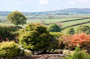 There are wonderful views over rolling countryside seen from the drive to the cottage.