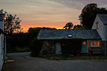 The sun setting slowly in the west behind Medlar Cottage.