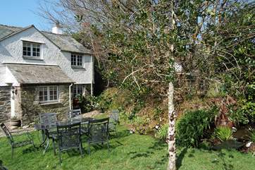 There is a sitting-out area just outside the cottage.