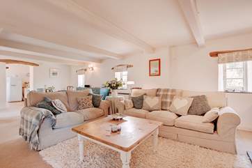 The cosy sitting-area around the wood-burner.