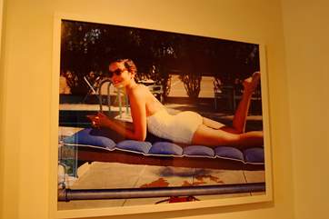 A fifties poster of Gene Tierney in the bathroom - how glamorous is she?