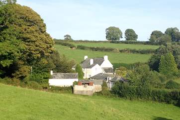 The view of all three cottages and the Owner's home from the fields opposite.