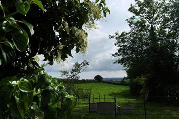 There is a communal seating-area in front of the courtyard with spectacular views down into Cornwall.