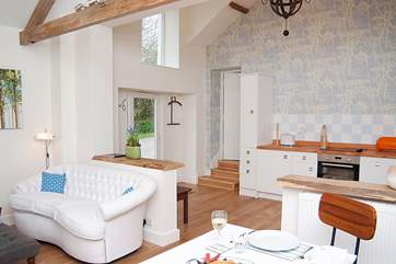 Looking across the living-room to the front door.