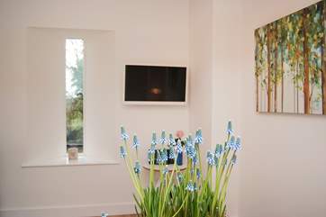 Pretty flowers and plants are always found in this gorgeous cottage.