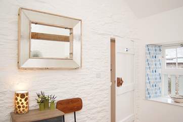 The Owner kept one of the old original windows in the bedroom, now fully glazed!