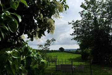 There is a communal seating-area in front of the courtyard with spectacular views down into Cornwall.