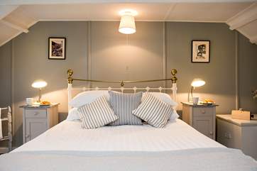 Bedroom Two on the second floor is beautifully decorated and has a super comfy king-size bed.
