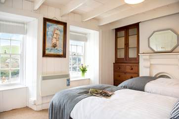 The twin bedroom at the front of the cottage is wonderfully light and also boasts fabulous views.
