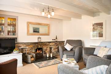 The sitting-room has an open fire making this a perfect retreat all year round.
