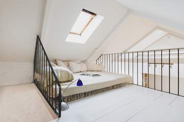 The second floor mezzanine snug where there's room to chill.