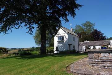 Looking across the gardens towards The Mouse House - the single-storey building behind the cottage is the laundry/boot-room.