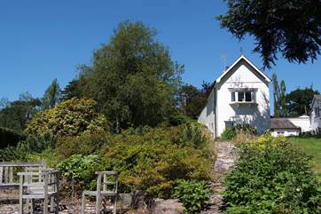 Looking up at the cottage - next door to the Owners but very private and with a really large garden.
