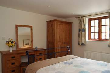 There is high quality oak furniture in Bedroom 1.
