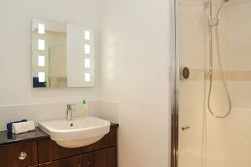 This shower-room is en suite to Bedroom 1 on the ground floor.