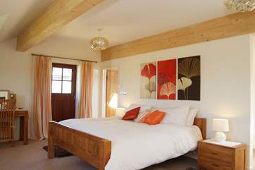 Bedroom 3 has a super-king size bed (6'), an en suite shower-room and dressing and sitting areas.