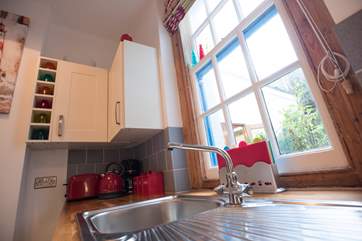 The tall sash window allows light to pour in.