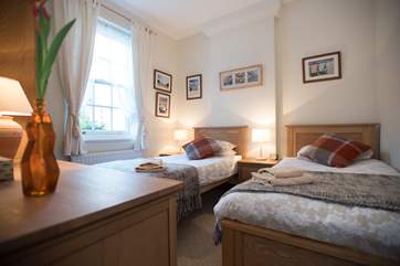 Bedroom 2 has twin beds.
