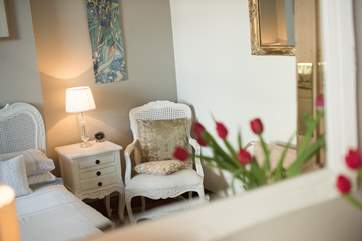 French-style furniture adds a chic feel.