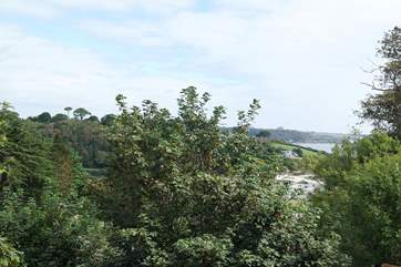You can see Swanpool beach and the sea through the trees from the Juliet balcony in Bedroom 2.