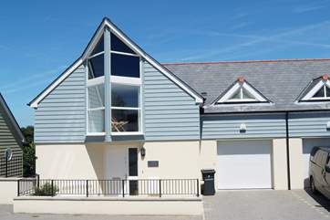 Built into a hill, Coastal Retreat is twice as big as it looks on arrival!