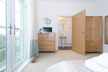 The master bedroom has an en suite shower-room.