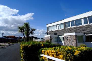 The approach to the property, The Lookout is the second in from the left in the terrace.