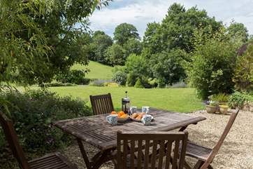 There is a gorgeous terrace overlooking the gardens and the countryside beyond.