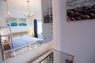 The master bedroom is lovely and light.