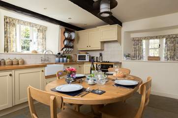 The kitchen is fitted as a true home-from-home, exceptionally well-equipped.