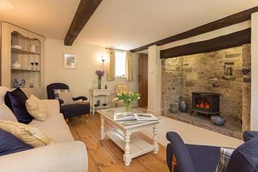 The cottage-style yet elegant living-room is such a calm place to relax in.