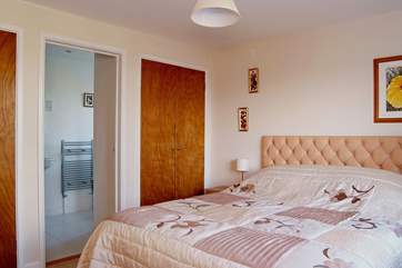 Bedroom 1 also has a king-size bed and an en suite shower-room.