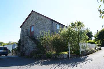 There is plenty of parking space, to the side of the house as well as in front.