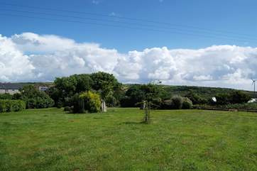 The gardens enjoy the most wonderful countryside views from all angles as well as the sea beyond.