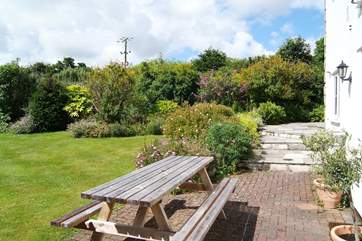 The perfect spot for a bit of al fresco dining with views of the lovely garden.