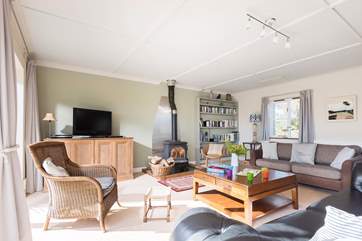 The huge sitting-room is light and spacious, with big comfy sofas, satellite TV, and an iPod dock.
