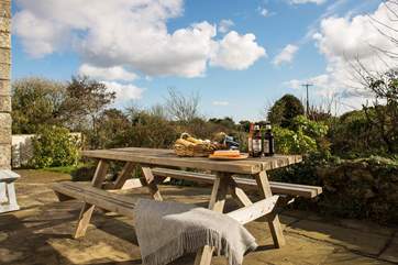 Dine out on the patio with a wonderful view of the garden.